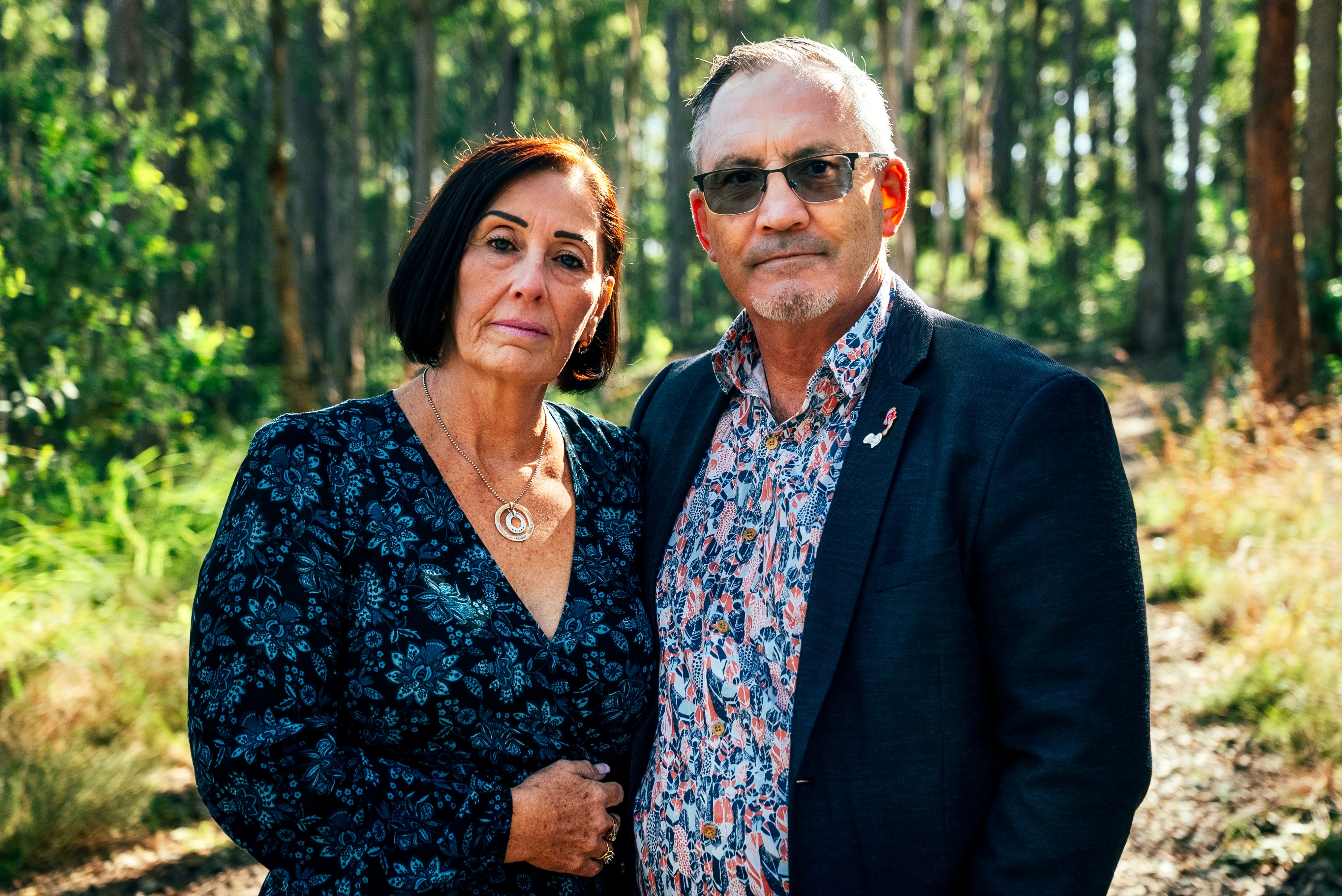 Sue and Lloyd Clarke stand on a bush track at Whites Reserve.