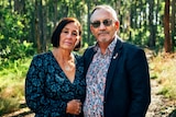Sue and Lloyd Clarke stand on a bush track at Whites Reserve.