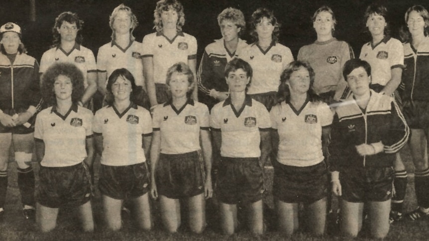 A newspaper photo of a women's football team.