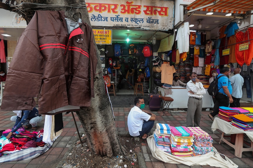 An exterior shot of an open shop in an Indian city. 