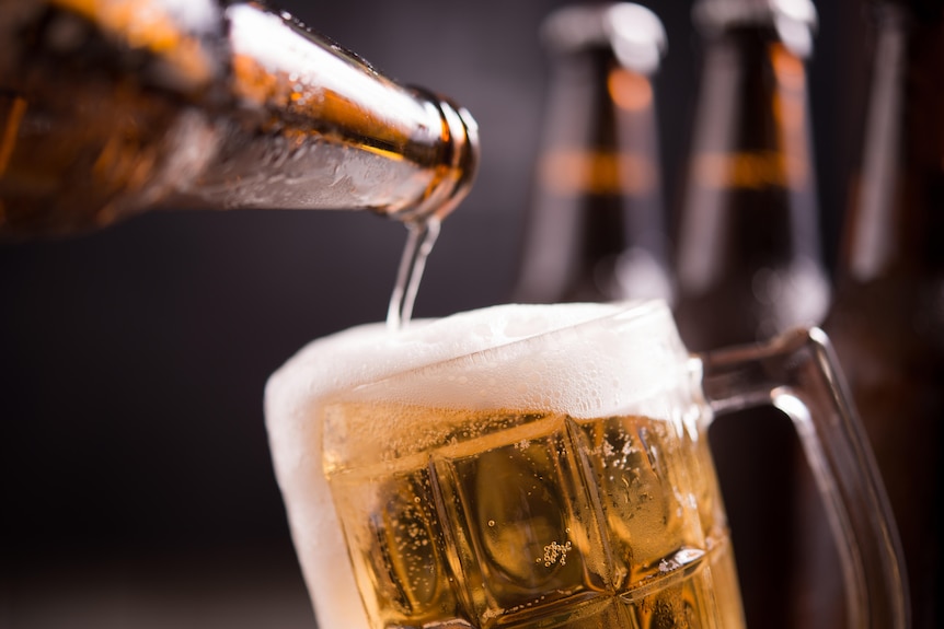 Beer being poured into a glass