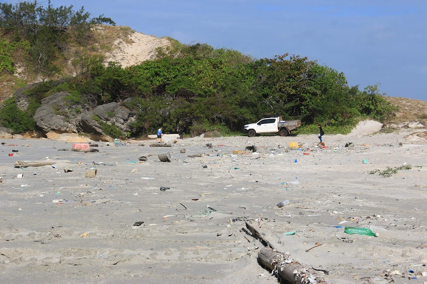 A photo of a beach covered in debris in East Arnhem Land.