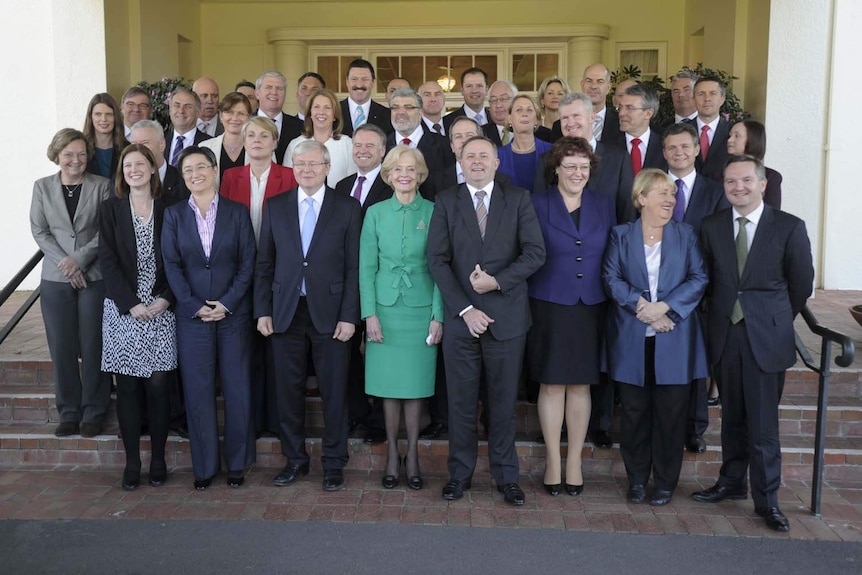 Prime Minister Kevin Rudd poses with his new ministry