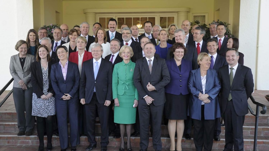Prime Minister Kevin Rudd poses with his new ministry