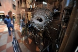 Gunmen killed seven six Pakistani police officers and two civilians.