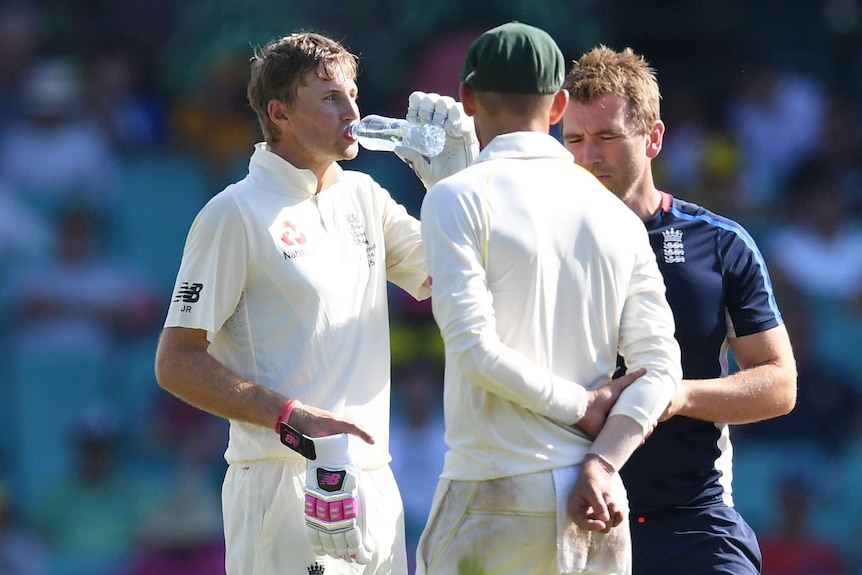 England's captain Joe Root takes in fluids on day four at the SCG on January 7, 2018.