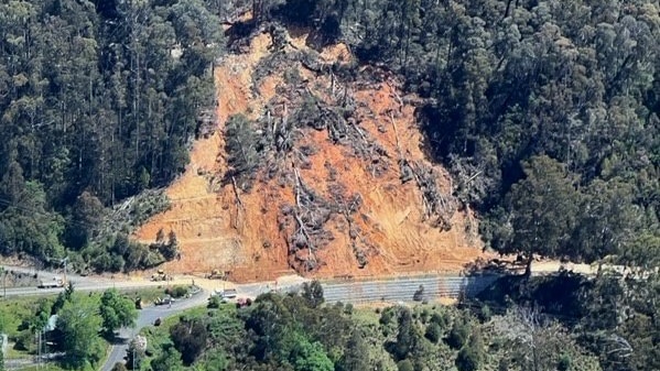 A landslide on a mountain face, as seen from above.