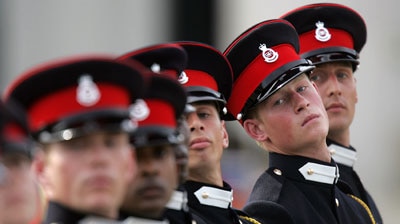 Prince Harry marches on parade at Royal Military Academy, Sandhurst.