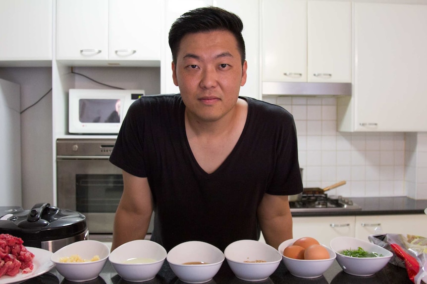 Jay Lee cooks in a kitchen