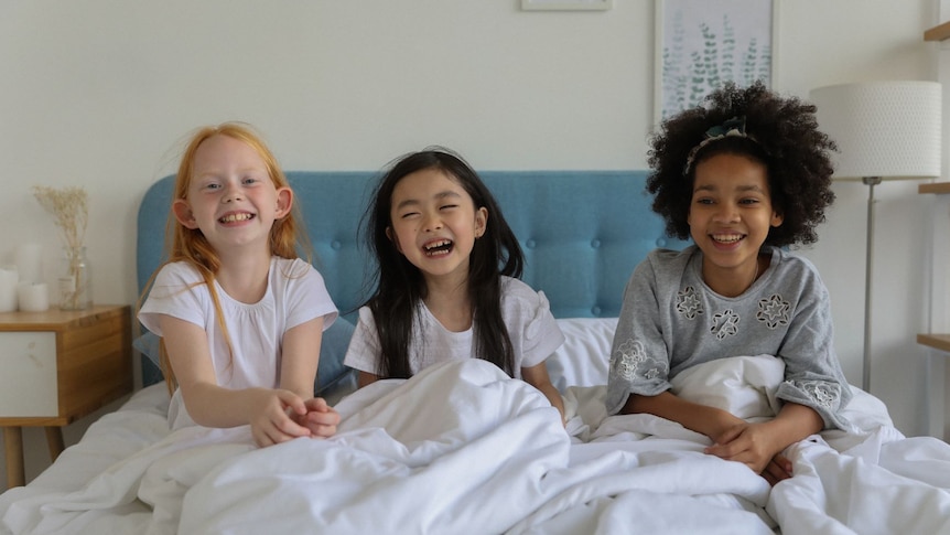 Children at a sleepover for story on how to know when your child is ready for a sleepover