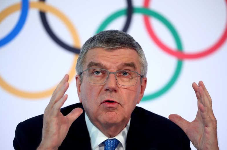 Thomas Bach gesturing while giving a speech.