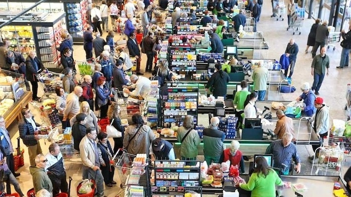 Crowds supermarket shopping