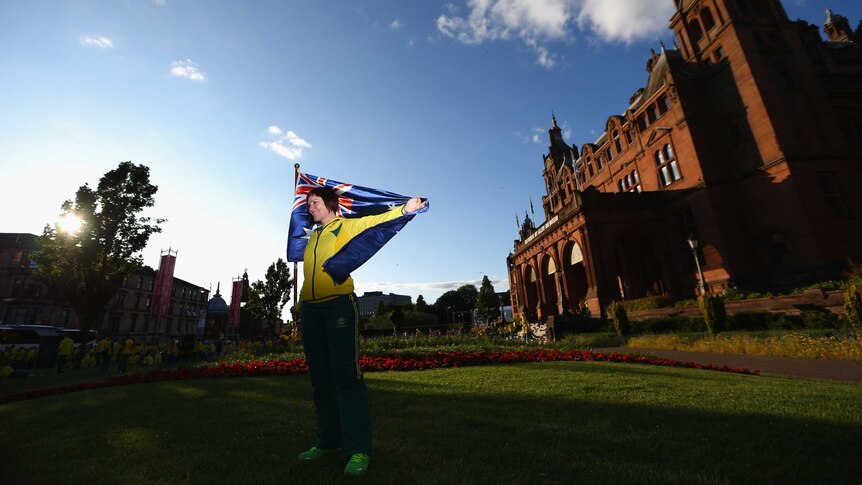 Meares poses with Australian flag