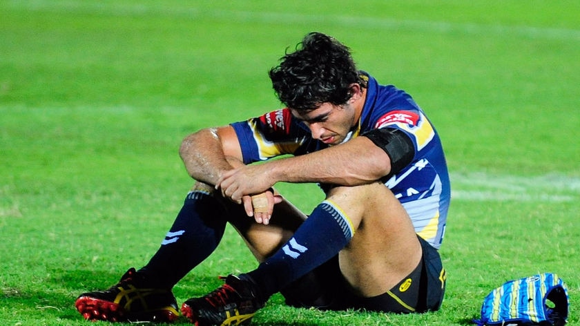Down and out... Johnathan Thurston contemplates another season without finals.
