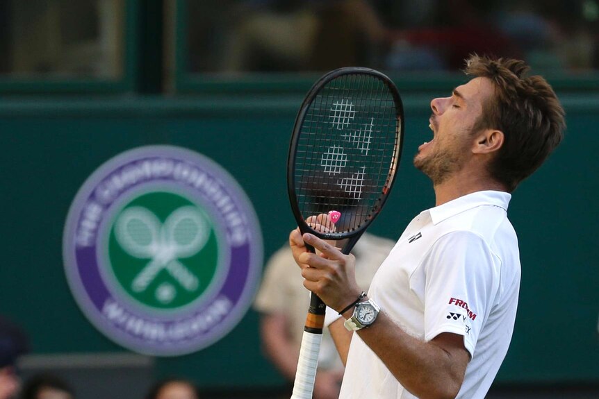 Switzerland's Stan Wawrinka celebrates a first-round win over Grigor Dimitrov at Wimbledon 2018.