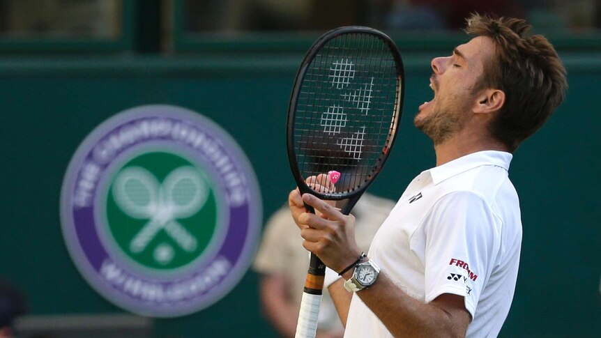 Switzerland's Stan Wawrinka celebrates a first-round win over Grigor Dimitrov at Wimbledon 2018.
