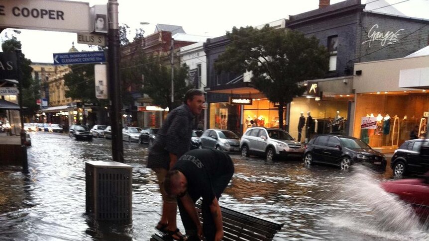 Pedestrians in Melbourne had to leap to higher ground following downpours in February.