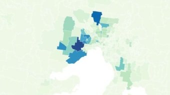 A map shows light green and dark blue postcodes of Melbourne, illustrating coronavirus hotspots in the north and west.