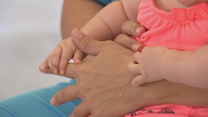 An unidentified mother and child inside Townsville Correctional Complex