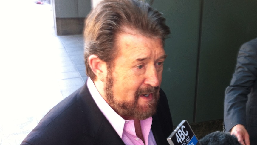Derryn Hinch arrives for a meeting in Brisbane with Qld Attorney-General Jarrod Bleijie