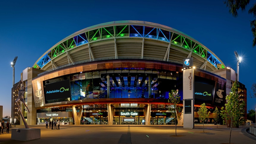 night shot of Adelaide oval showing the south gate entrance and ov