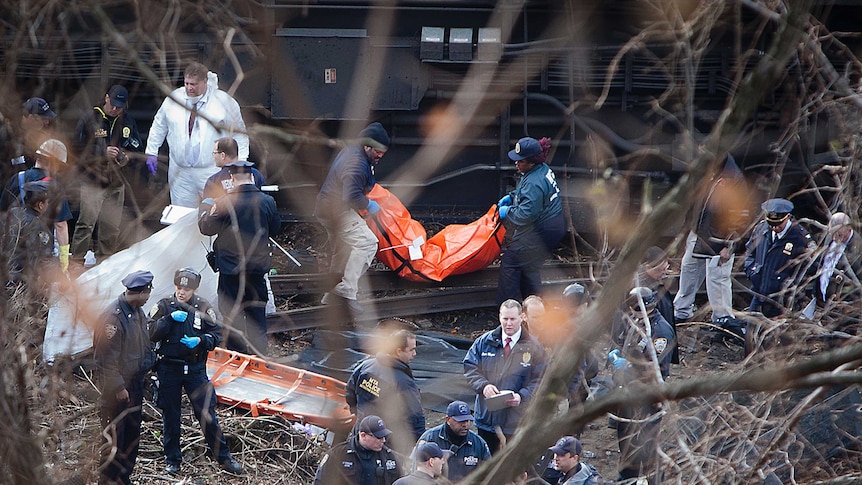 Emergency workers at scene of NYC train crash