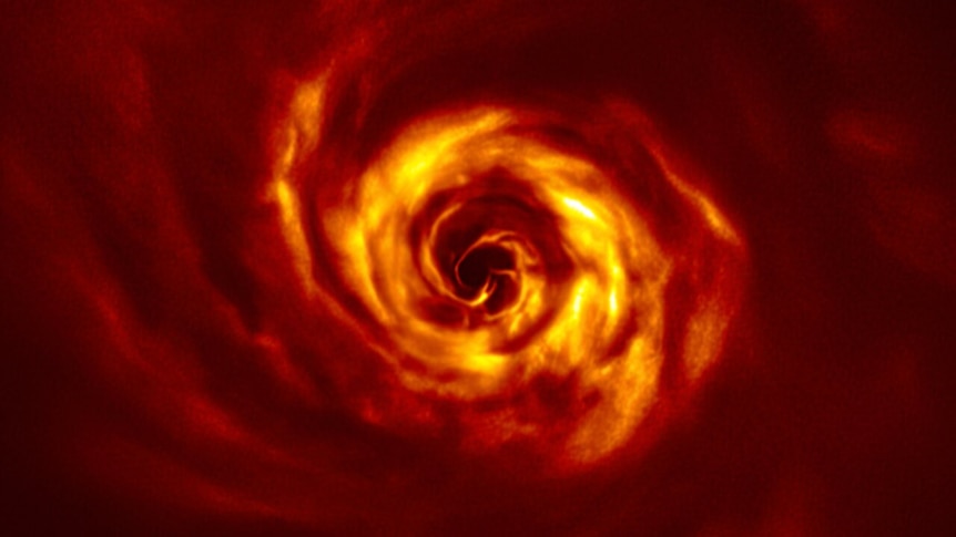 A red, yellow and orange spiral much like a cyclone with a black 'eye' in the centre.