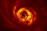 A red, yellow and orange spiral much like a cyclone with a black 'eye' in the centre.