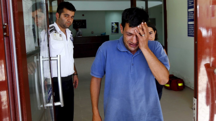 Abdullah Kurdi, father of three-year old Aylan Kurdi, cries as he leaves a morgue in Mugla, Turkey