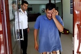Abdullah Kurdi, father of three-year old Aylan Kurdi, cries as he leaves a morgue in Mugla, Turkey