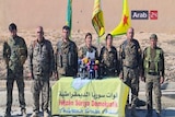 Frame grab from video provided by Arab 24 network shows officials with the US-backed Syria Democratic Forces at a press conferen