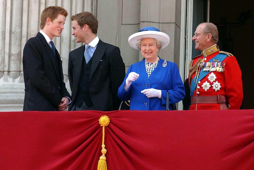 Princes Harry and William with Queen Elizabeth II and the Duke of Edinburgh on the balcony of Buckingham Palace.