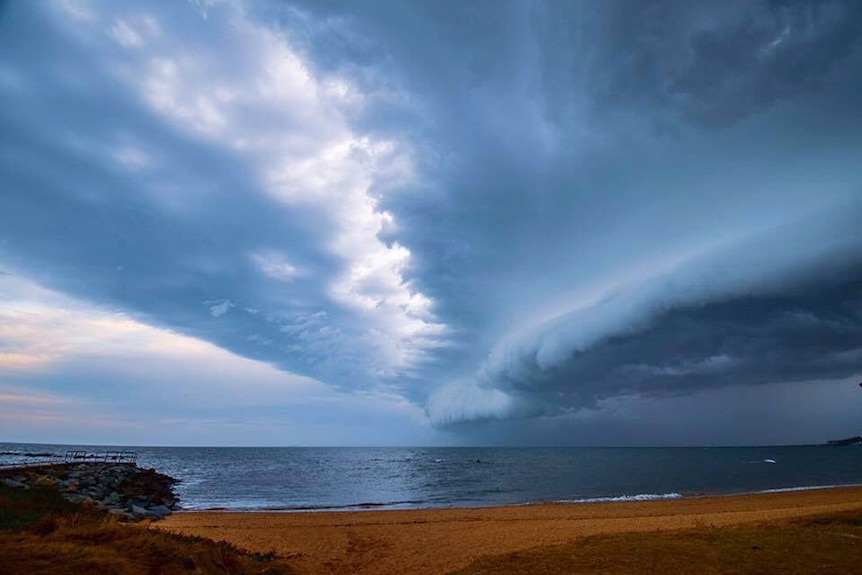 Storm clouds over a beach at Redcliffe , north of Brisbane.