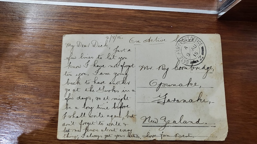 old post card with old fashioned cursive writing 