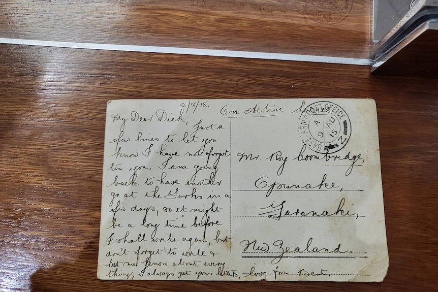 old post card with old fashioned cursive writing 