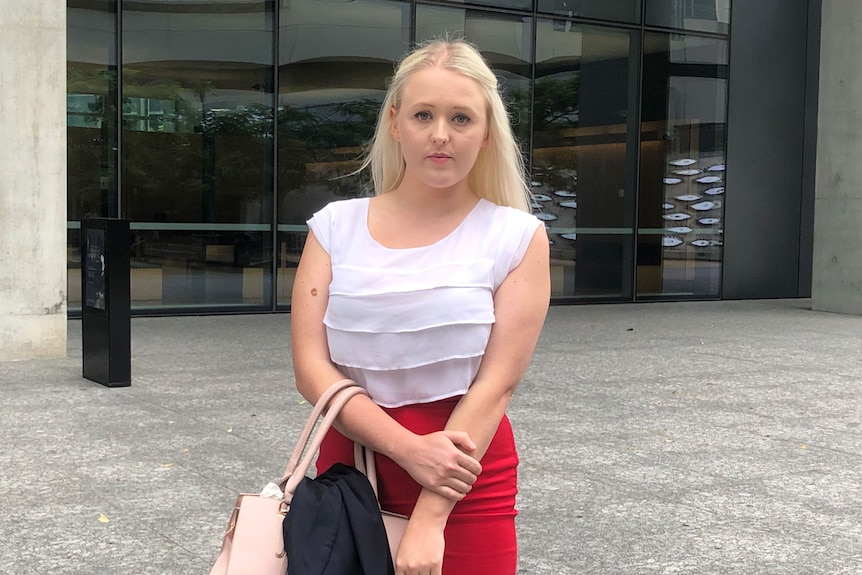Jessica Small stands outside the District Court in Brisbane on March 11, 2021.