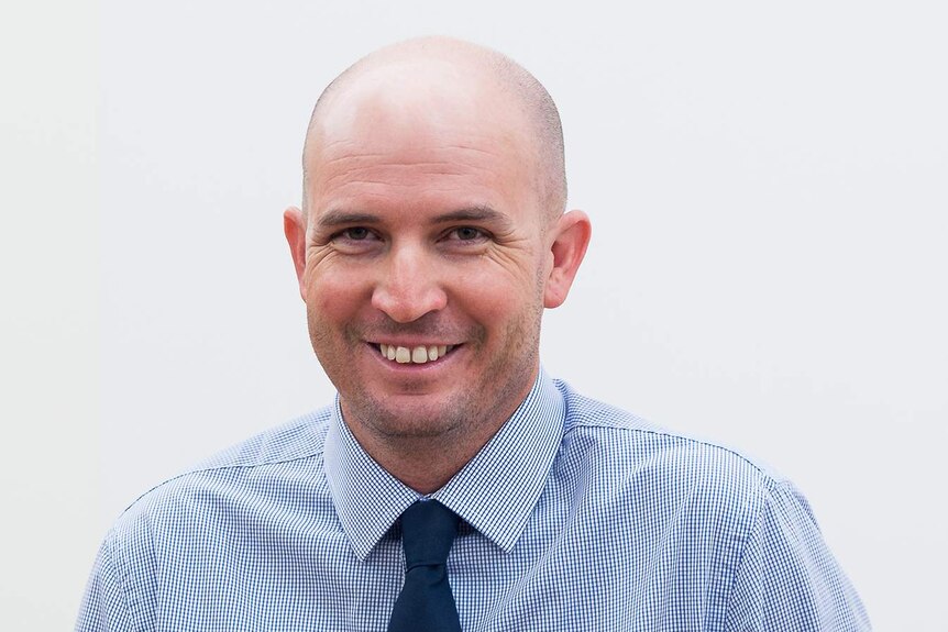 Smiling headshot of Cloncurry Mayor Greg Campbell in north-west Queensland.