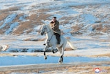 Kim on horse galloping