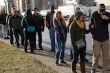 People queue to buy recreational marijuana in Colorado.