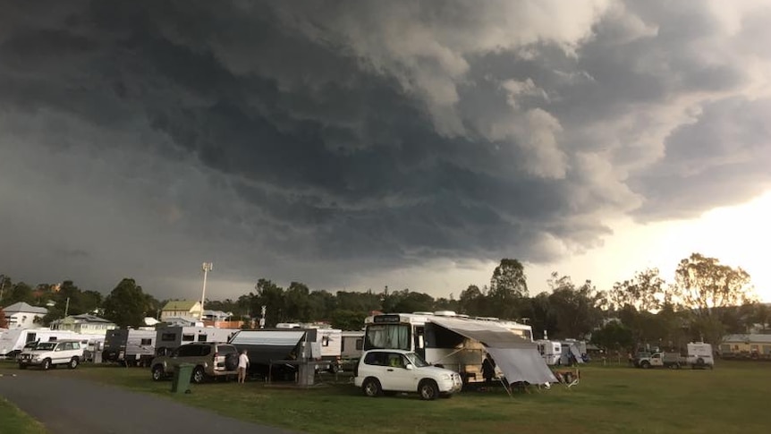 Storm clouds gather over caravans in Boonah, in Queensland's south.