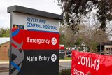 The Riverland General Hospital entrance sign, with arrows pointing to the ED and main entry.