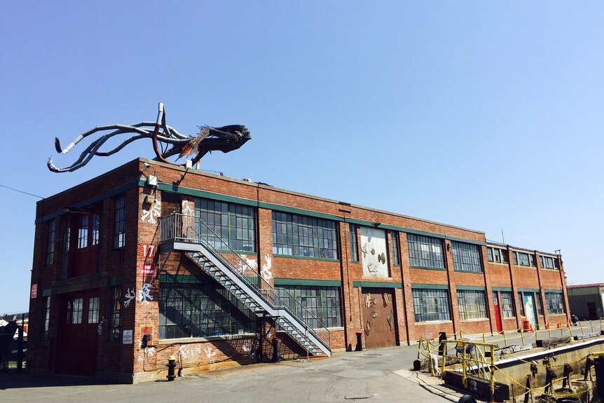 A building and artwork at the East Boston shipyard, home to KO Pies