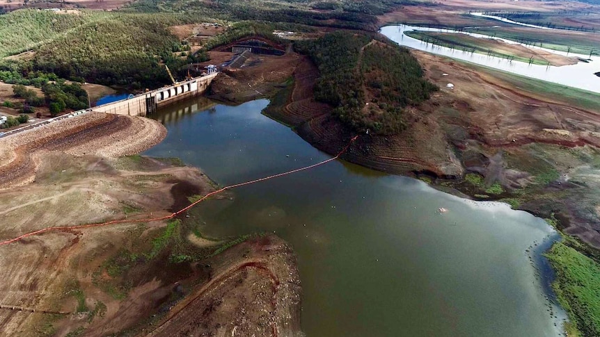 Aerial view of keepit dam at less than 1 per cent capacity, the water is well below the dam wall.