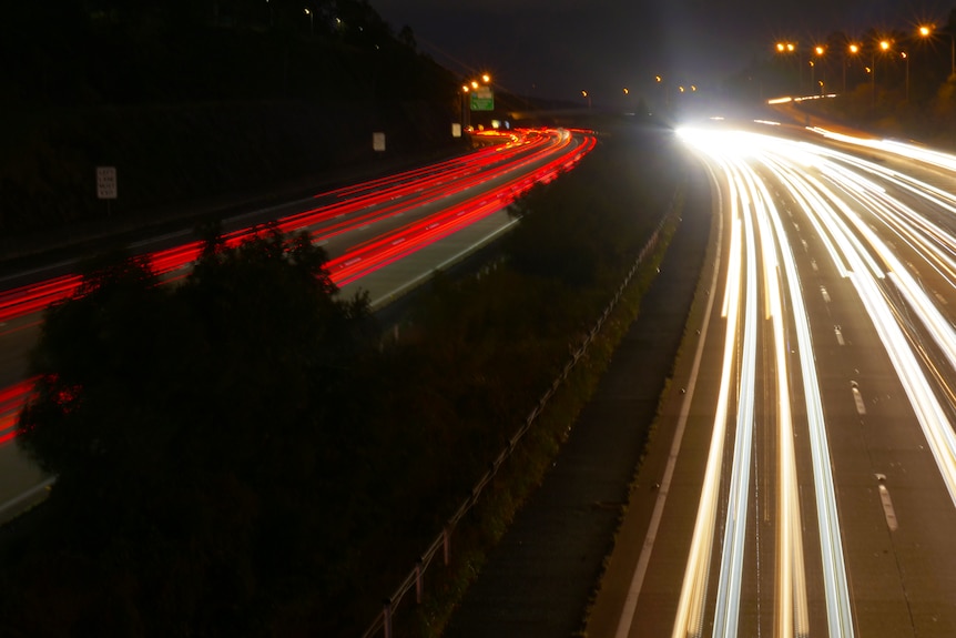A long exposure shot of the M1 Pacific Motorway traffic at Helensvale. 