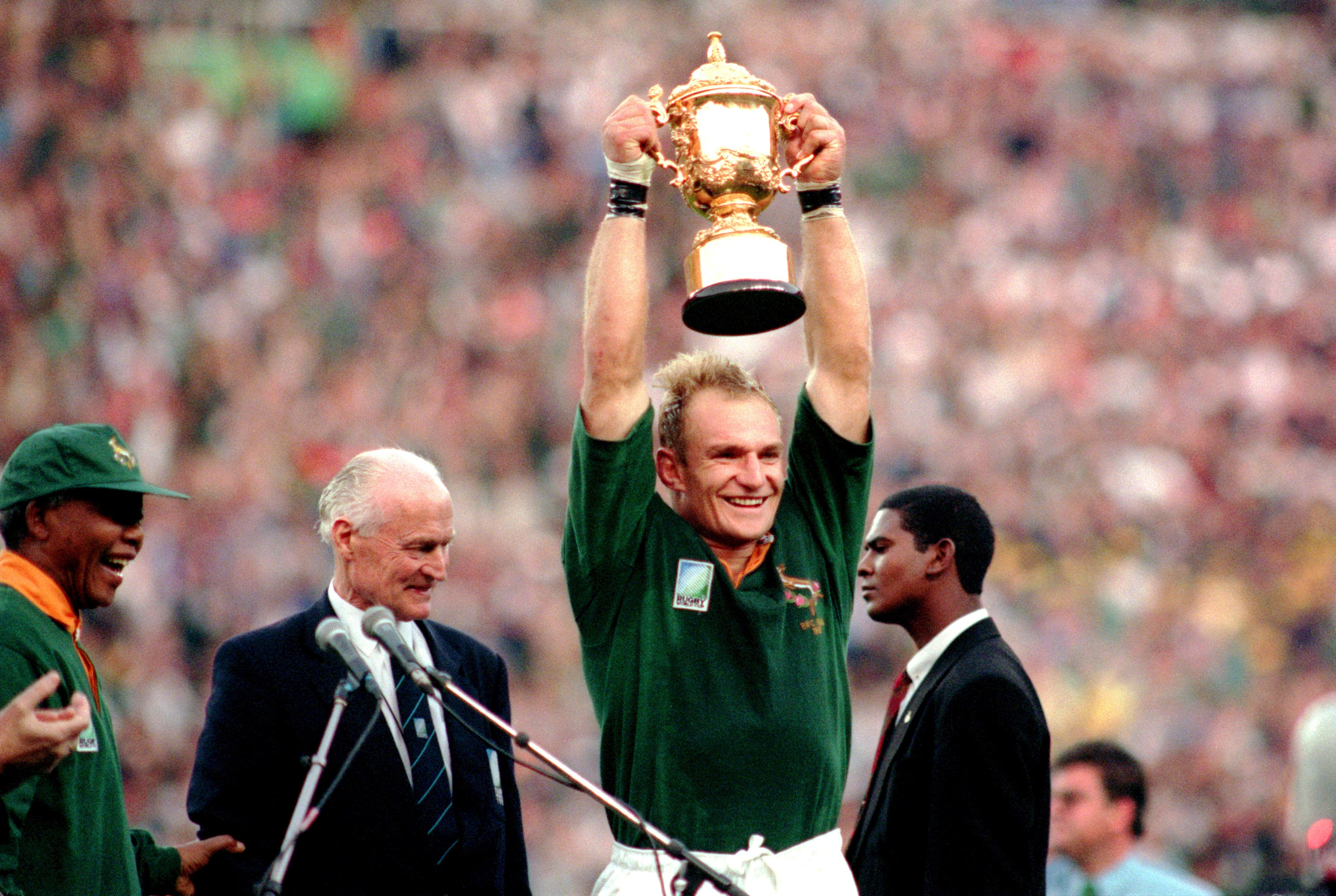 Sportsman Francois Pienaar holding the Webb Ellis Trophy in 1995.
