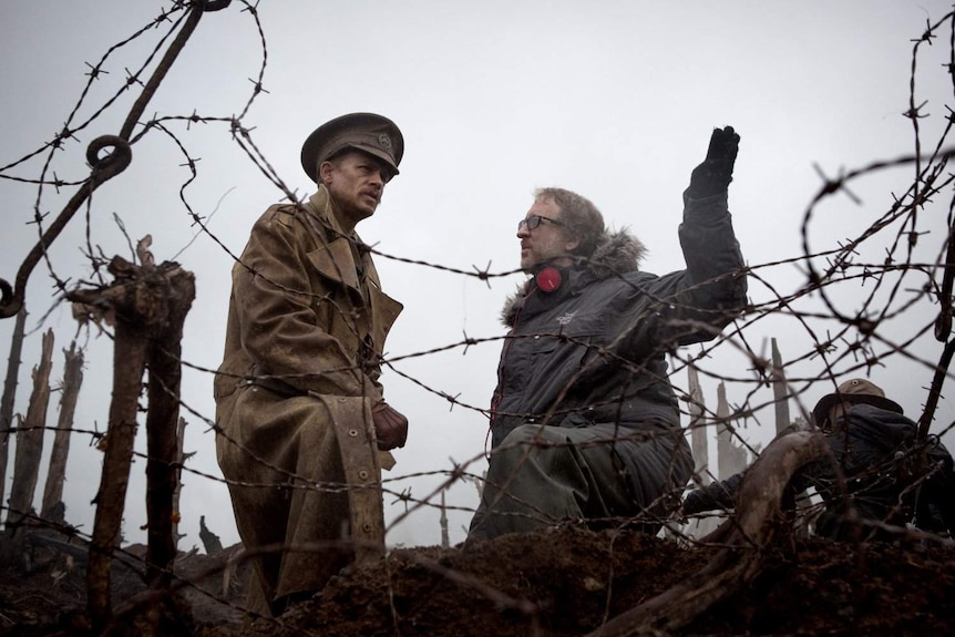 Still image of director James Gray with actor Charlie Hunnam on the set of The Lost City of Z