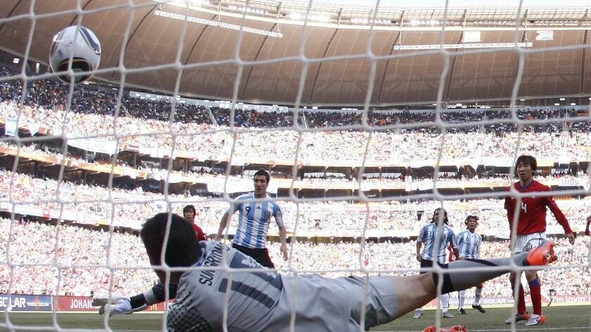 Gonzalo Higuain (2nd L) scored three as Lionel Messi pulled the strings for Argentina.