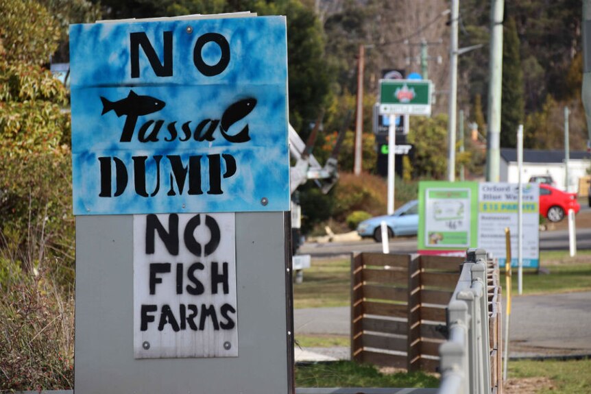 Salmon farm protest sign