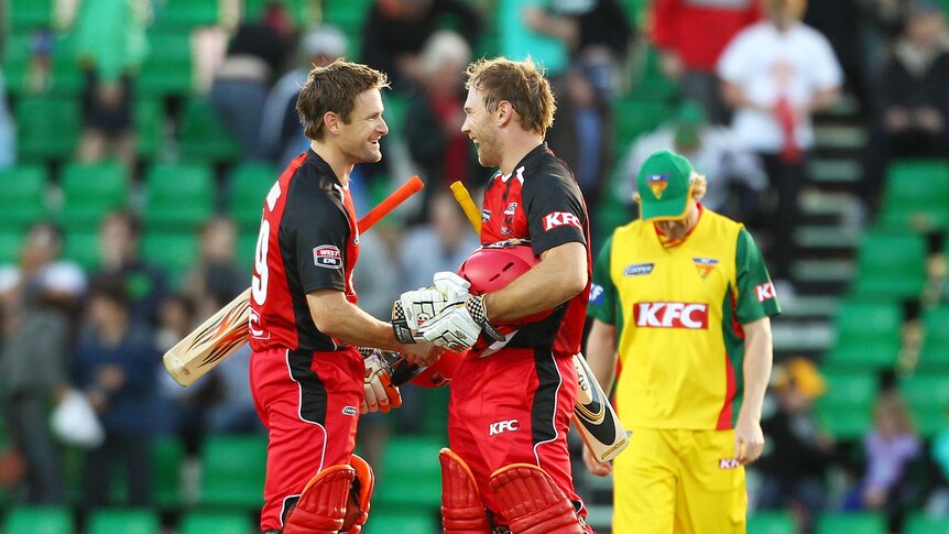 Job done: Daniel Harris (l) and Aiden Blizzard all smiles after an easy Redbacks win.