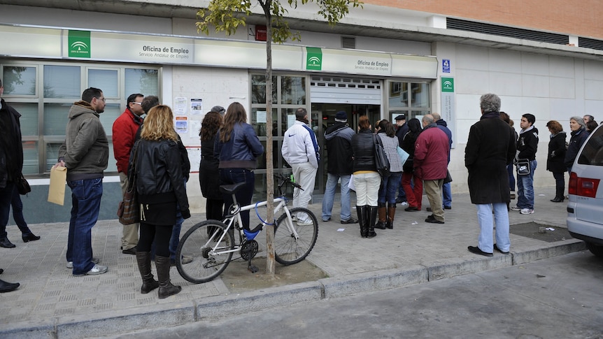 Spaniards wait in line at employment office